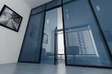 Фото Вкатні суцільноскляні двері системи NAYADA - Standart - оптимальне рішення для компактних офісів